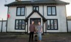 Ian and David Johnston-Oates with their dog Zak, owners of Drumlithie Inn.