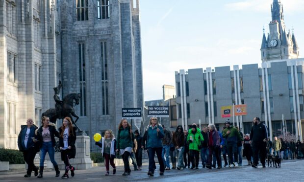 Anti-vax and anti-vaccination mandate protestors marched the streets of Aberdeen.