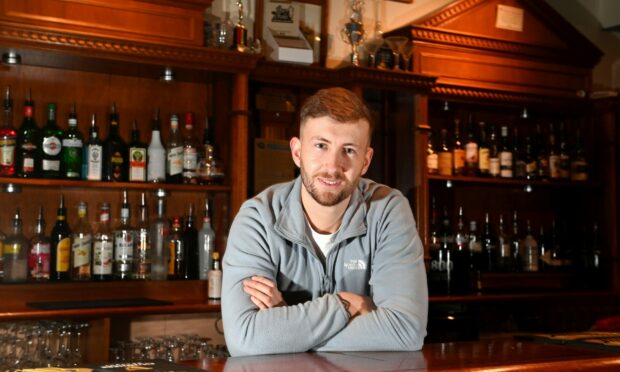 Toast of the town: Lewis Brown is proud to be continuing his grandad's legacy at The Blue Lamp.