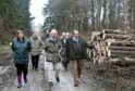Prince Charles walks along Scots Mile with (left) Suzanna Atkinson, Visitor Services Officer, Haddo Country Park and (right) Oliver Deeming, Landscape Officer (Formartine), Aberdeenshire Council