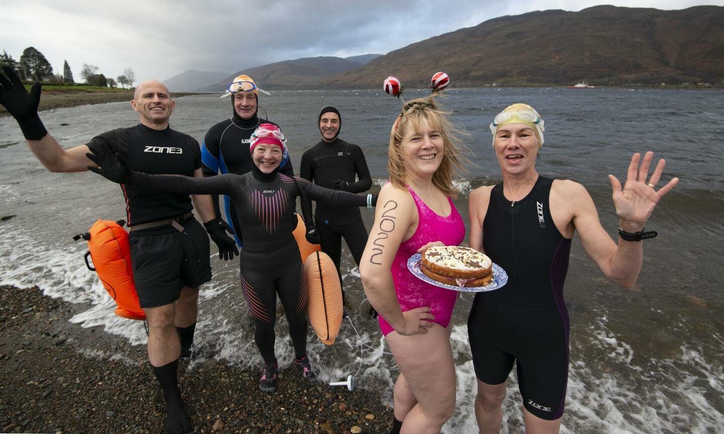 Swimmers across the north and north-east brave icy waters in New Year’s ...