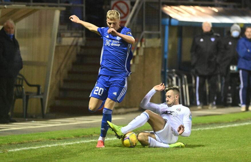 Ryan Duncan in action for Peterhead against Cove Rangers