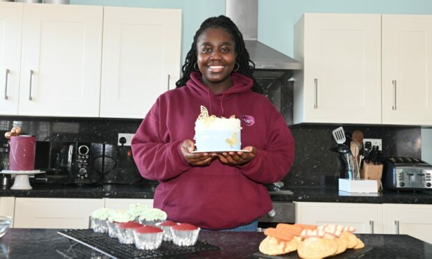 Lois Owusu-Afriyie runs her own baking business, Lois Caked It, from her home kitchen.