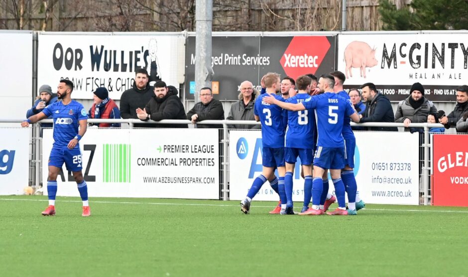 Cove Rangers players celebrate Rory McAllister's goal