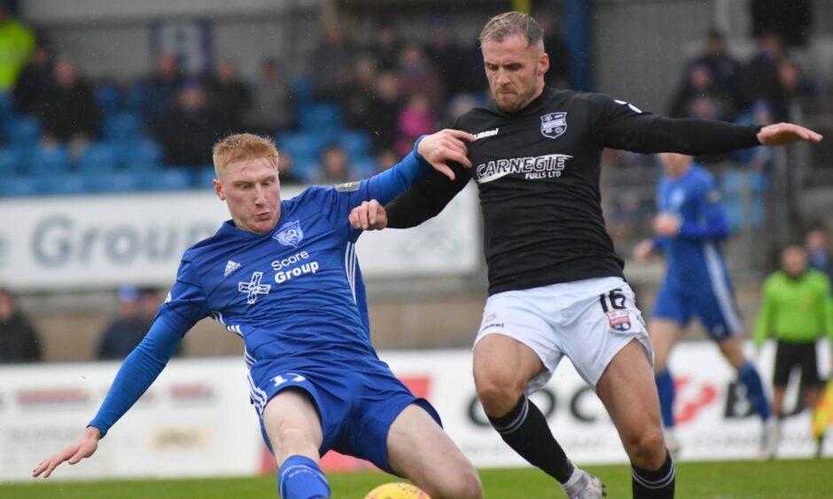 Peterhead defender David Wilson, left, in action against Montrose