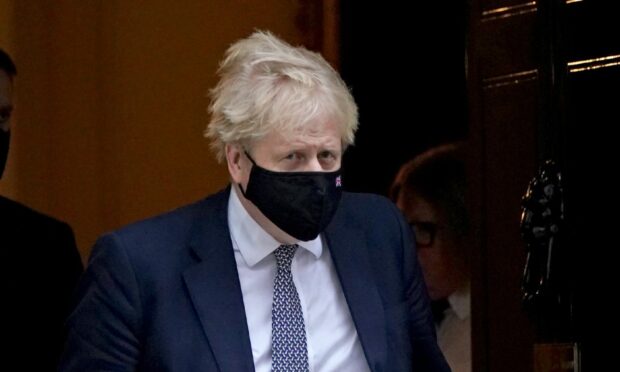 Prime Minister Boris Johnson leaves 10 Downing Street to make a statement in the House of Commons, Westminster, after it was announced that Scotland Yard has launched an investigation into a "number of events" in Downing Street and Whitehall in relation to potential beaches of coronavirus laws.  Photo: Stefan Rousseau/PA Wire