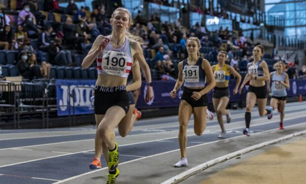 Aberdeen AAC's Roisin Harrison (190) and Kathryn Christie (181) running the 400m in Glasgow in 2022. Image: Bobby Gavin.