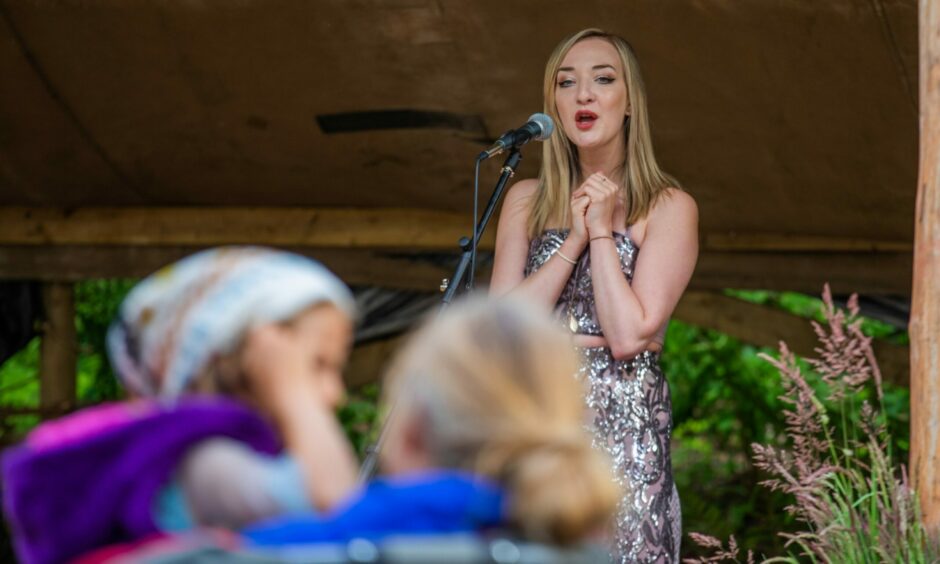 Iona Fyfe performing at the Scottish Crannog Centre in Perthshire