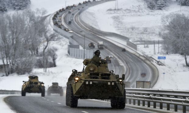 An estimated 100,000 Russian troops with tanks and other heavy weapons have gathered near Ukraine.