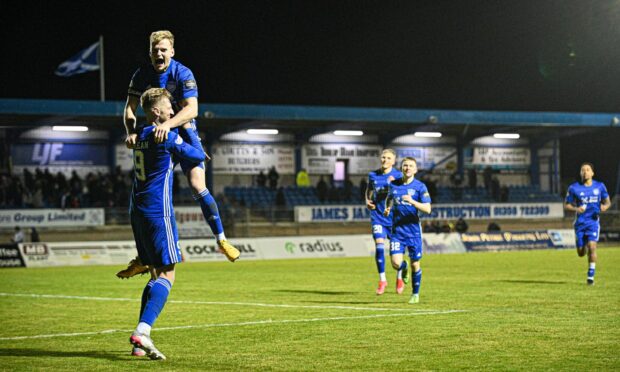 Peterhead players celebrate their penalty shoot-out victory over East Kilbride