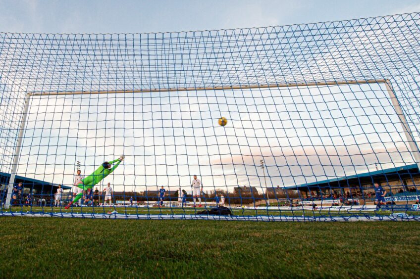 Andy McCarthy's volley puts Peterhead in front
