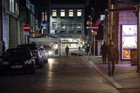 Belmont Street, popular destination for revellers in Aberdeen, was quiet after restrictions were lifted. Picture by Wullie Marr.