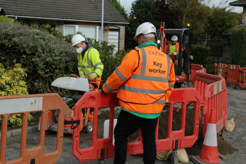 CityFibre workers installing fibre, to give Inverness superfast broadband. 