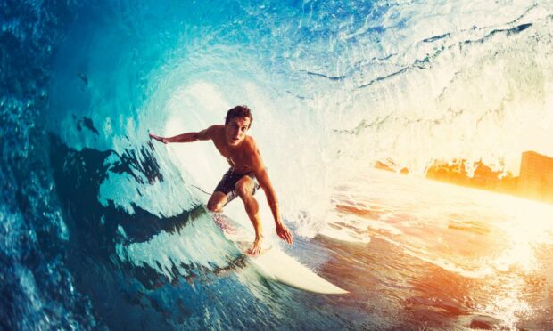 Neil Lovatt, of Scottish Friendly, says investing in cryptocurrencies is like surfing waves, "skilfully riding them up and down and enjoying the fun".