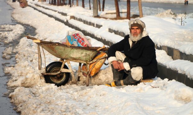 A man waits for work in Kabul, Afghanistan (Photo: Xinhua/Shutterstock)