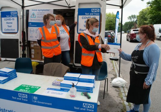 Highland Council and NHS Highland are giving out Covid tests for people who need them. Photo by Maureen McLean/Shutterstock