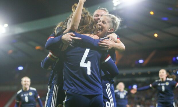 The Scotland team celebrating during the FIFA Women's World Cup qualifiers.