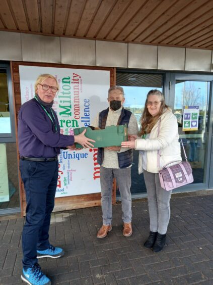 Wick Budding Engineers' Dave and Liz Kerr with Milton of Leys Primary HT Robert Gill deliver digital design devices to Milton of Leys