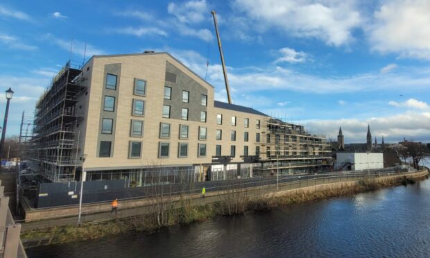 Scaffolding around the hotel in Glebe Street, Inverness, is now being taken down as construction works near completion.