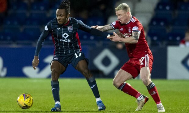 Ross County's Regan Charles-Cook (L) and Jonny Hayes of Aberdeen.