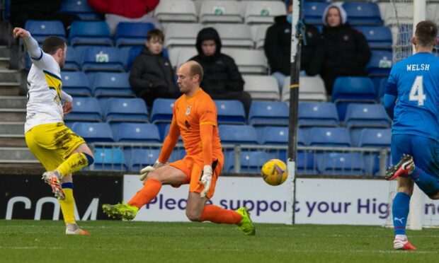 Lewis Strapp opens the scoring for Morton against Caley Thistle.