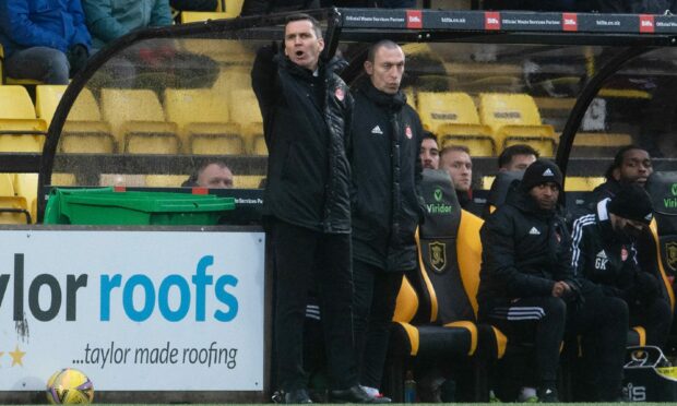 Aberdeen Manager Stephen Glass and Scott Brown during the loss at Livingston.