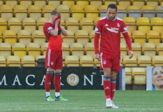 Aberdeen dropped out of the top six following their defeat by Livingston