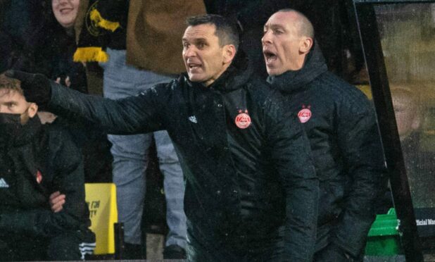 Aberdeen boss Stephen Glass and Scott Brown during a loss to Livingston. Image: SNS