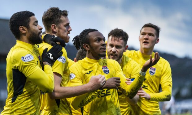 Regan Charles-Cook celebrates his goal for Ross County against Dundee.