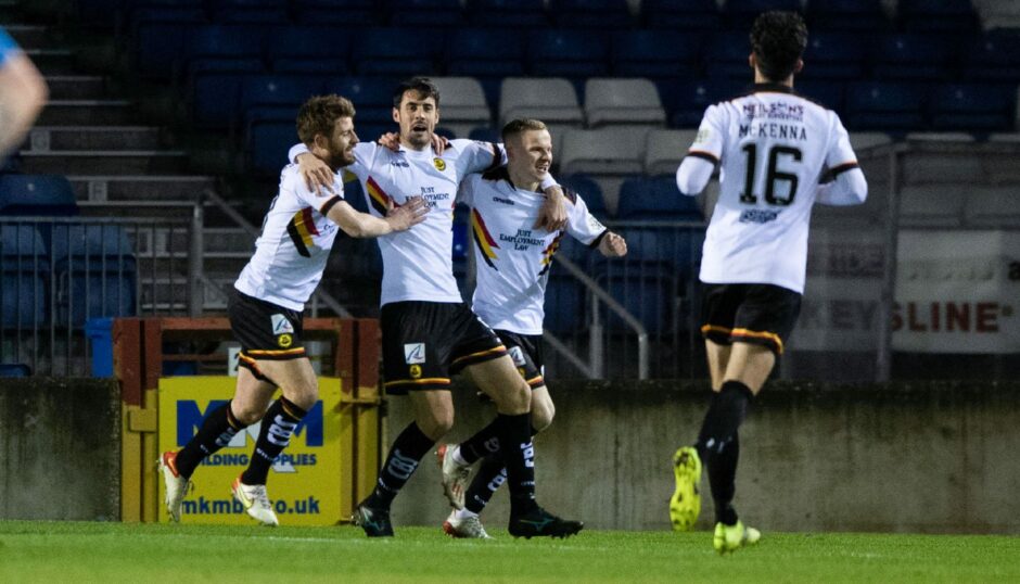 Brian Graham celebrates putting Partick Thistle in front against Caley Thistle