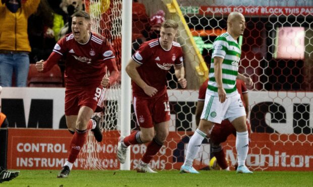 Aberdeen's Christian Ramirez (L) celebrates after scoring to pull it back to 2-1 against Celtic.
