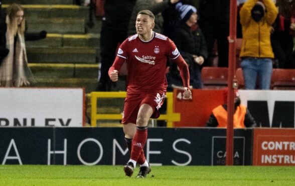 Christian Ramirez celebrates scoring against Celtic in midweek.