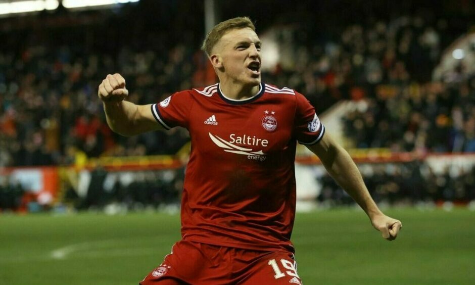 Aberdeen's Lewis Ferguson celebrates scoring against Celtic .