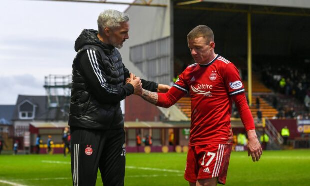 Aberdeen Manager Jim Goodwin with Jonny Hayes.