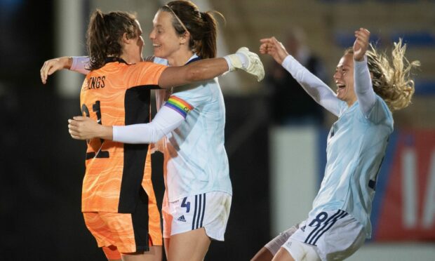 Scotland's Eartha Cummings (left) celebrates with Rachel Corsie and Claire Emslie after winning the penalty shootout.