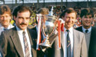 Scottish Premier League Champions, 1984/85. Dons captain Willie Miller (left) and manager Alex Ferguson with the league championship trophy at the presentation at Pittodrie. ABERDEEN JOURNALS Ltd. 7.5.1985.