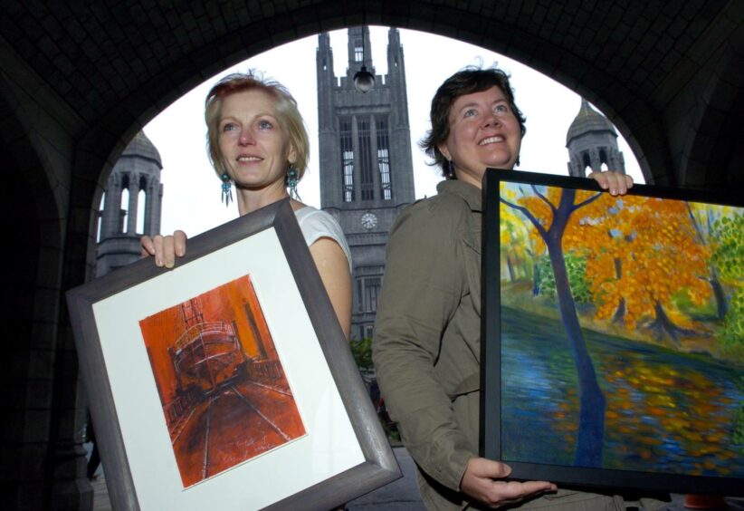 Artists Rosemary Taylor and Clare McCarthy with pictures from their exhibition at Marischal Museum. Photo: Kevin Emslie.