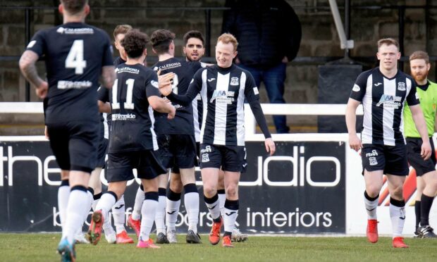 The Elgin players celebrate after Rabin Omar makes it 2-0 against Stirling Albion.