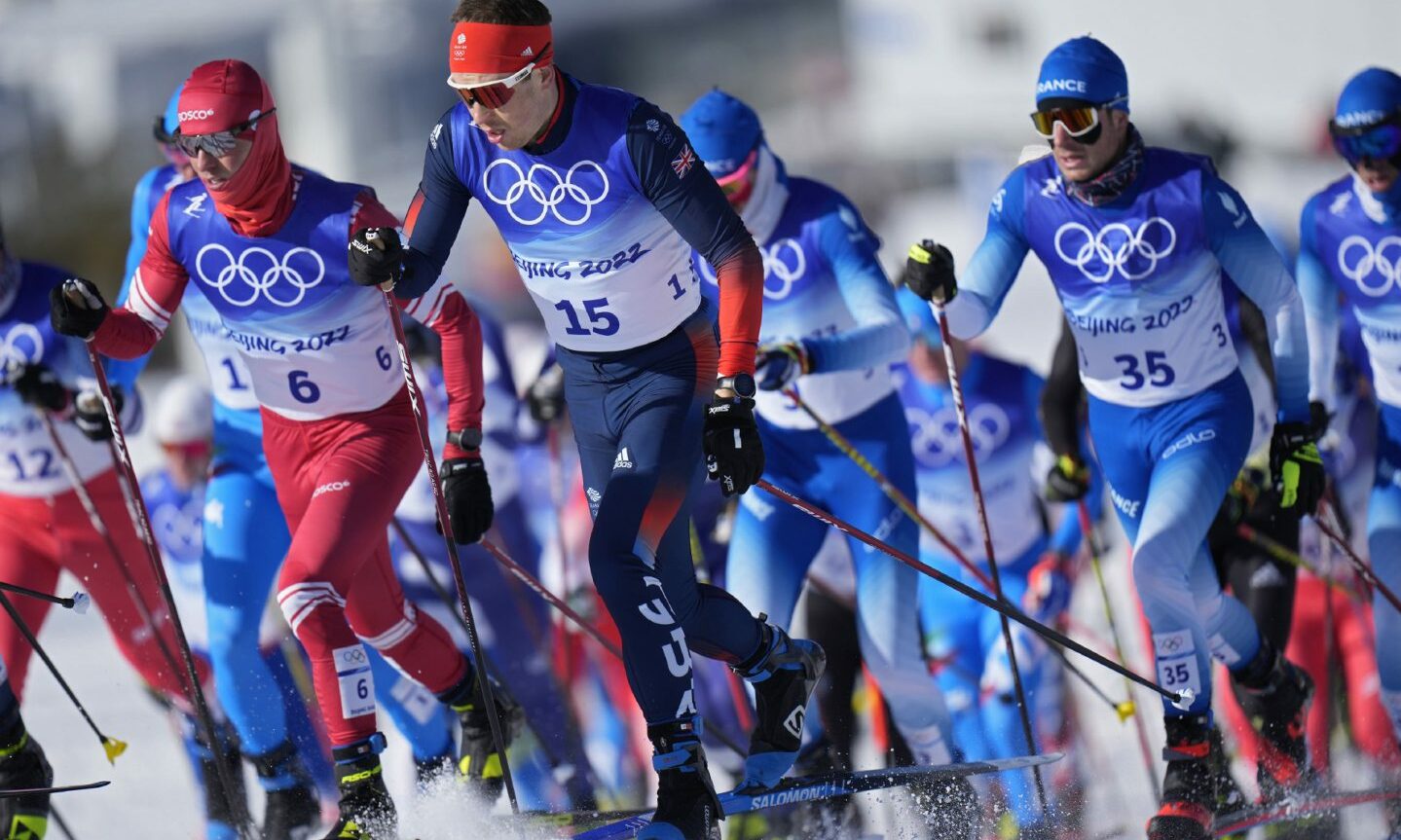 Britain's Andrew Musgrave (15) competes during the men's 15km + 15km skiathlon cross-country skiing competition at the 2022 Winter Olympics.