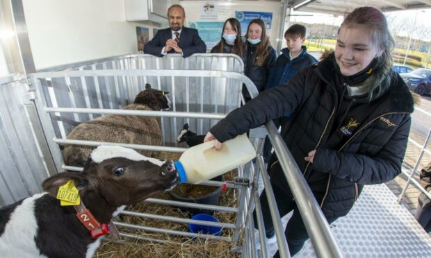 Aberdeen City Council Education Operational Delivery Convener Councillor M Tauqeer Malik and Bucksburn Acdemy pupils