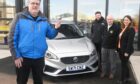 The winner of the Bon Accord Centre car raffle Neil McEwan, with Craig Shirlaw, Alan Pirie and Charlie House's Donna Deans. Picture by Chris Sumner.