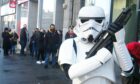 Stormtrooper Bryan Jenkins pictured outside Geek Retreat's official opening on Union Street. Picture by Chris Sumner.
