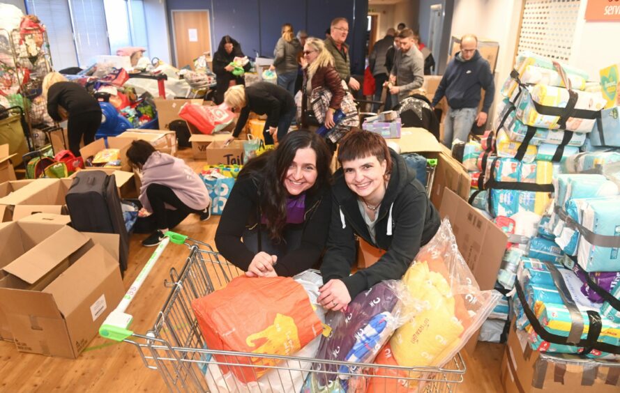 Adrianna Sosnowska and Kasia Cwiklinska with donations in Aberdeen. Picture by Chris Sumner
