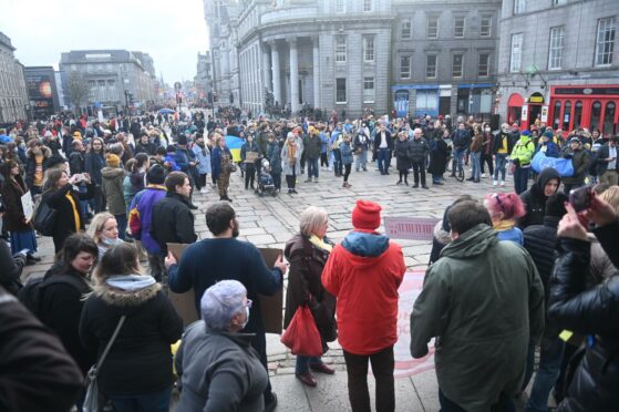 People gathered at Castlegate in Aberdeen to show solidarity with the people of Aberdeen. Photo: Chris Sumner/DCT Media.