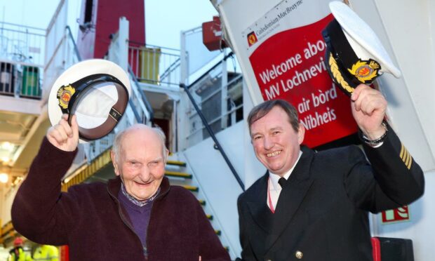 Donald MacAskill, known as Dolan, with his captain's hat and Master Iain Mackenzie