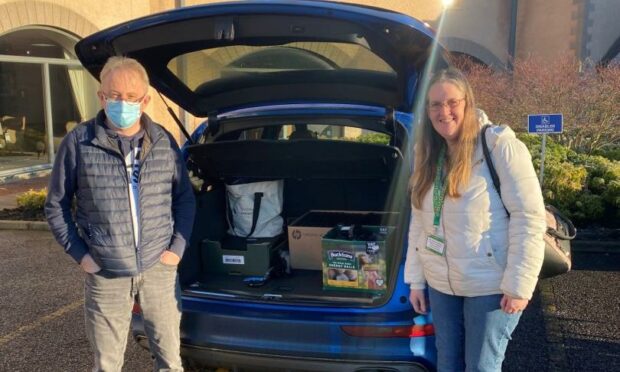 Budding Engineers' Dave and Liz Kerr have donated almost 300 laptops, desktops and other digital devices to young people in need, en route to their goal of 870 by March.
