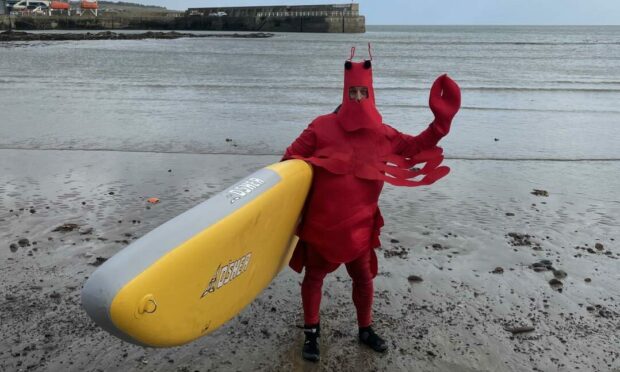 Stonehaven paddleboarding business owner, Dave Jacobs, is to feature in star-studded comedy sketch for Red Nose Day. Supplied by Dave Jacobs.