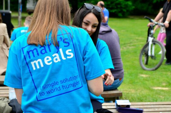 Sisters Abak and Aping have been helped by Mary's Meals