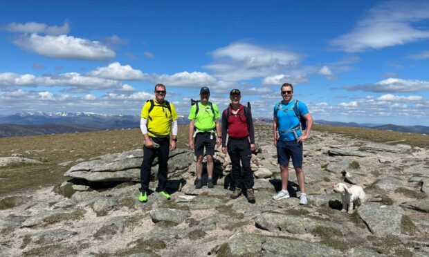 Pictured at the White Mounth Munros on one of the practice walks for last year's challenge are (from left to right): Rob Wicks from AFC, Mark Wilson, Eric Harper and Iain Landsman. Supplied by AFCCT.