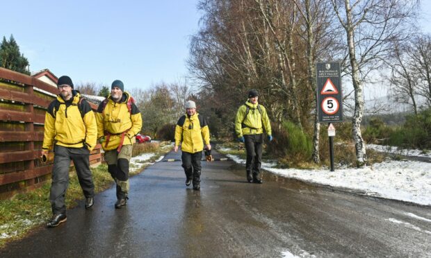 A search party near the Spey Valley golf course in Aviemore. Picture by Jason Hedges